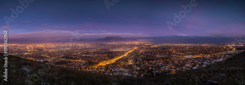 City scape over Cape Town South Africa at dawn, as seen from Tygerberg hill in the Northern Suburbs of Cape Town.