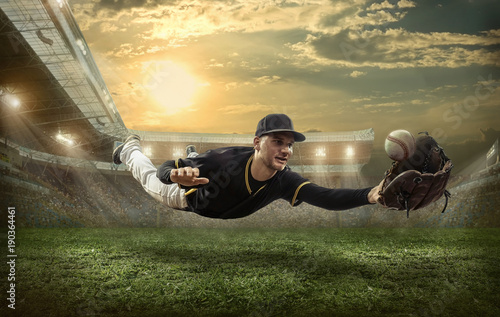 Baseball players in action on the stadium. photo