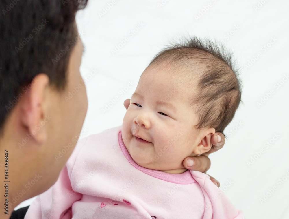 Happy Asian Father Look with love. newborn baby daughter, dad see baby. Dad with baby girl, love. New born child looking on dad. Happy Asian Father Look with love. newborn baby daughter, dad see baby. Dad with baby girl, love. New born child looking on dad.
