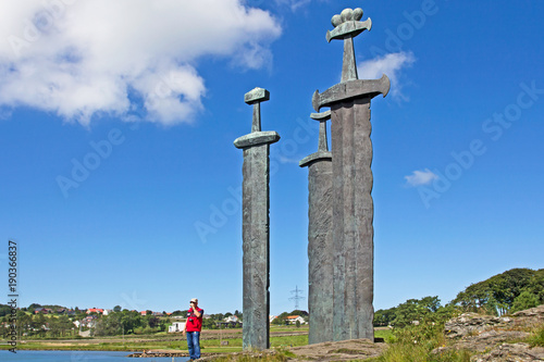 Three giant bronze swords sculpture at Hafrsfjord, Norway photo