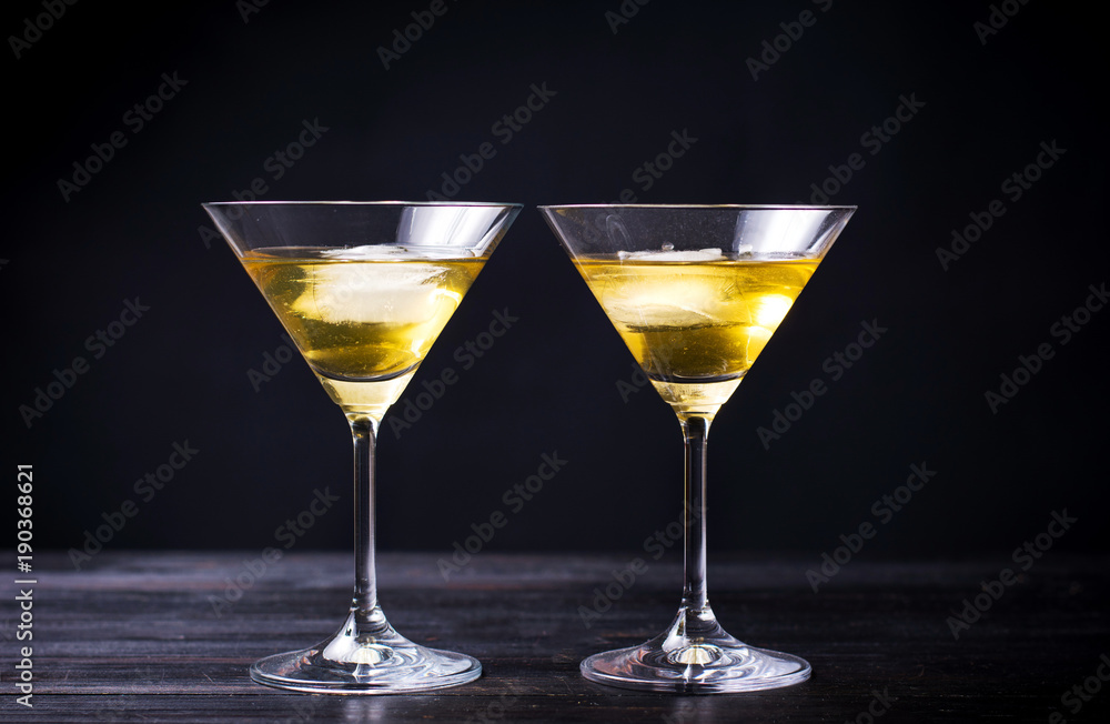 Two martini cocktails on a table Two martini cocktails on a table