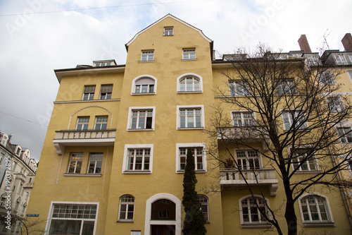 Row of houses with old building houses in Schwabing, colorful facade