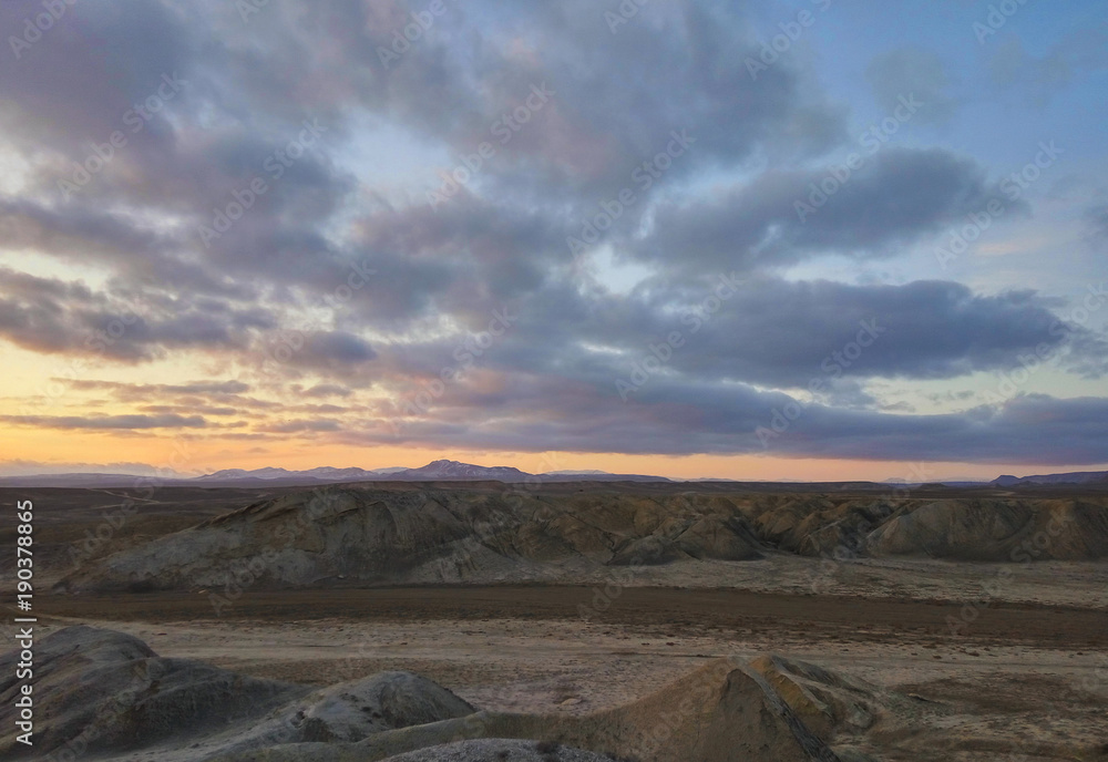 The expanses of the steppes of Gobustan at sunset of the day