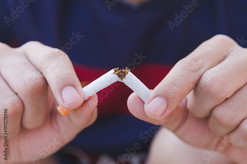 Stop cigarette  man hands breaking the cigarette with clipping path