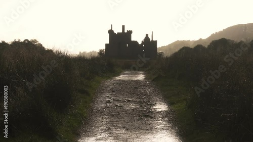 Ancient Castle on a lake in Scotland after the rain