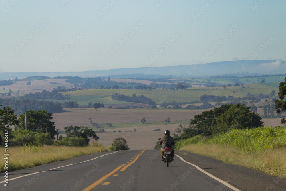 Fototapeta premium Riding a lonely road