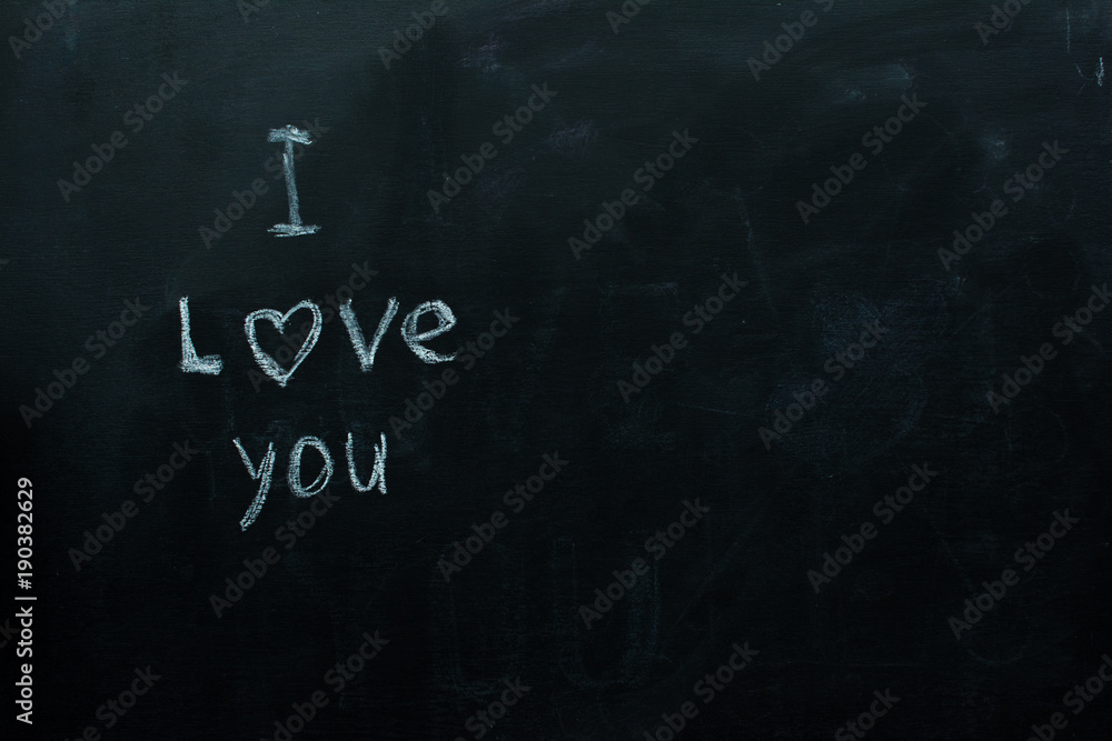 inscription on black chalkboard: I love you