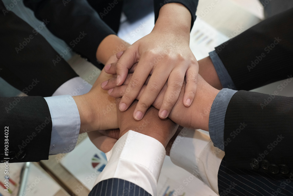custom made wallpaper toronto digitalbusinessman joining hand, business team touching hands together - unity, harmony, teamwork, partnership, collaboration, corporate concept.