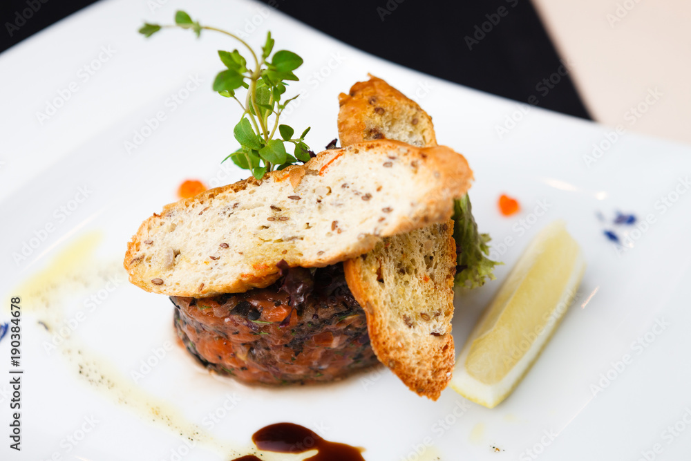 Salmon tartar with red caviar Salmon tartar with red caviar
