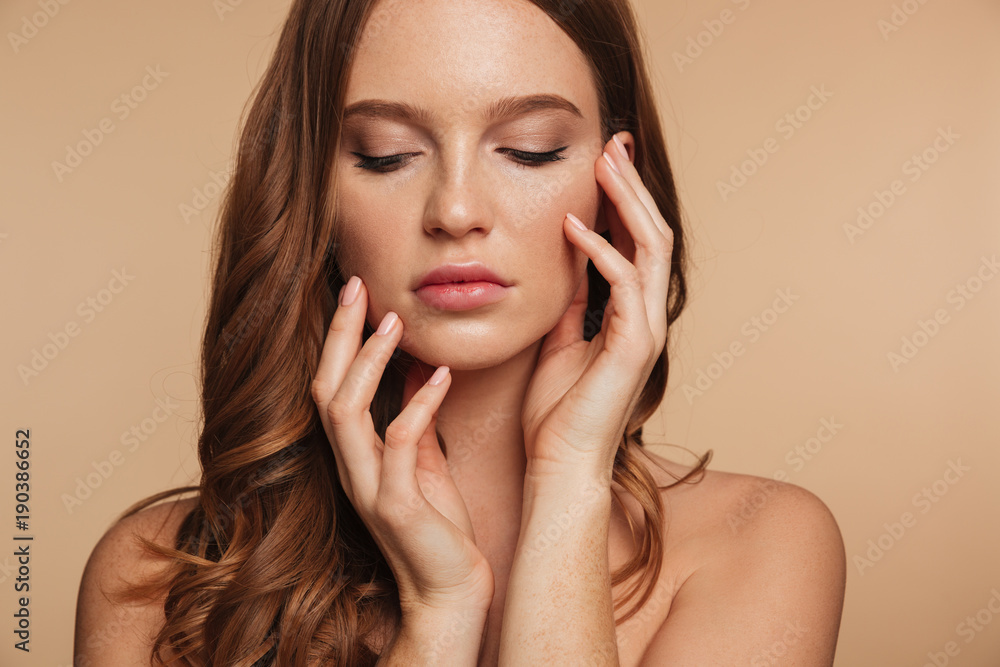 Close-up Beauty portrait of sensual ginger woman with long hair Close-up Beauty portrait of sensual ginger woman with long hair