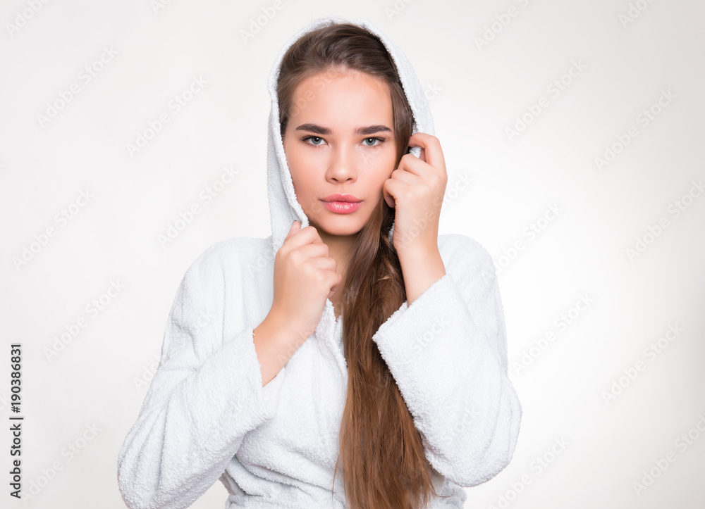beautiful young woman with long hair wearing a bath robe beautiful young woman with long hair wearing a bath robe