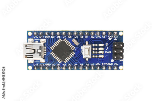 Arduino Nano-board for the implementation of school laboratory work on electronics and robotics. Isolated on white background flat layout. photo