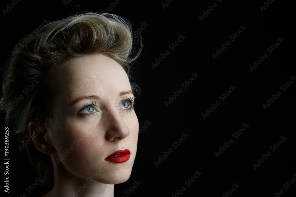 portrait of girl with red lips on black background portrait of girl with red lips on black background