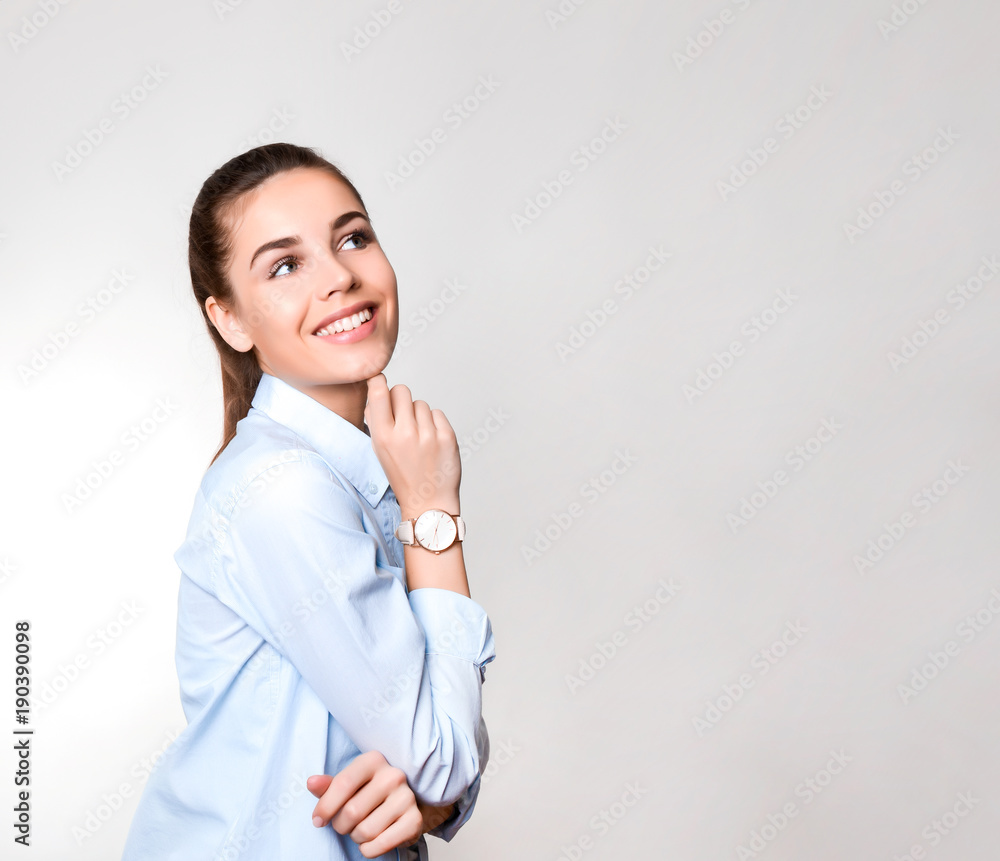beautiful young woman with long hair wearing wrist watch beautiful young woman with long hair wearing wrist watch