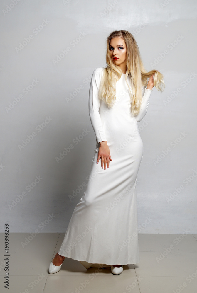 beautiful sexy girl posing in white dress beautiful sexy girl posing in white dress