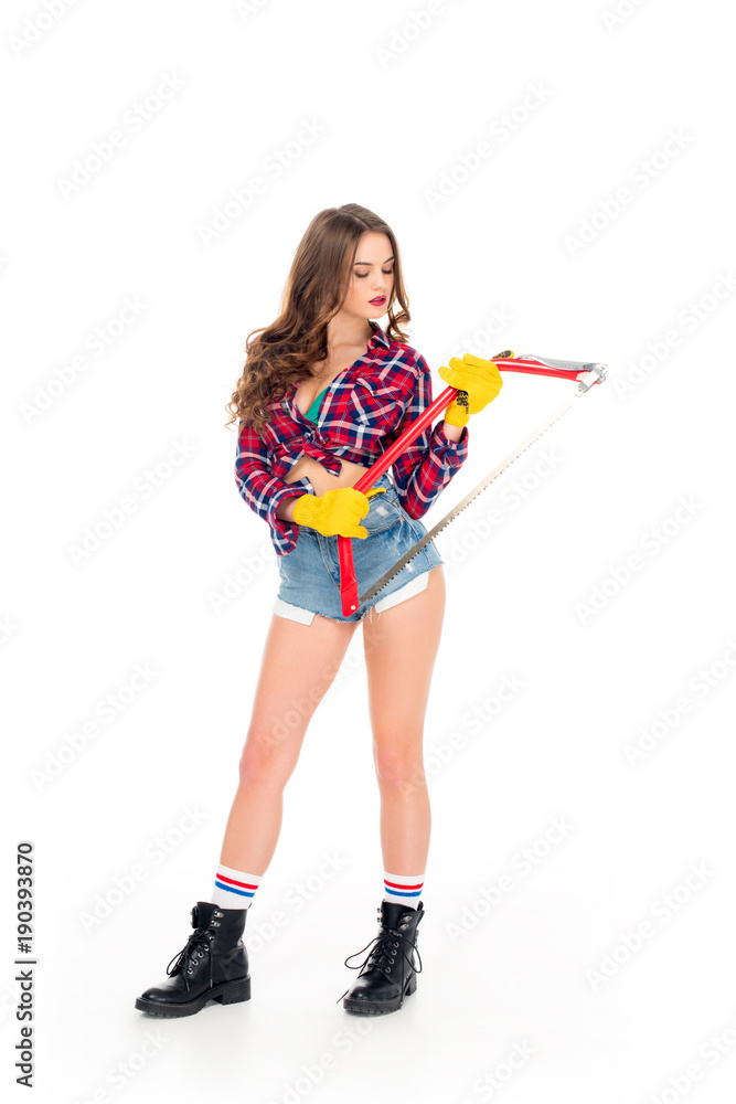 beautiful seductive girl posing with bow saw, isolated on white beautiful seductive girl posing with bow saw, isolated on white