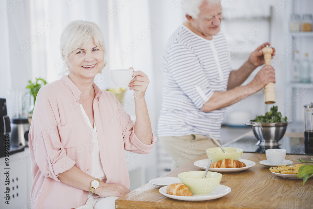 Smiling senior woman drinking tea Smiling senior woman drinking tea