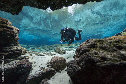 divers underwater caves diving Ginnie Springs Florida USA photo