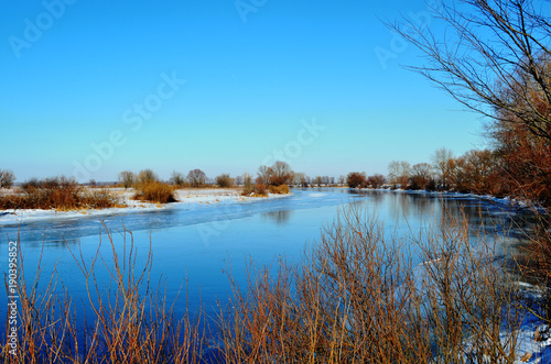 Winter river. Melt water