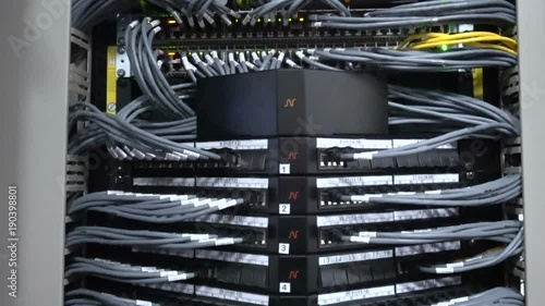 Cables and connections on network server. Video in motion. There is a small noise