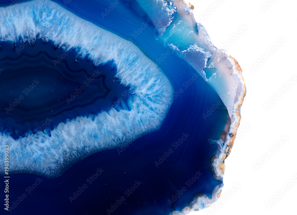 Foto Polished multicolor agate slice isolated on white background