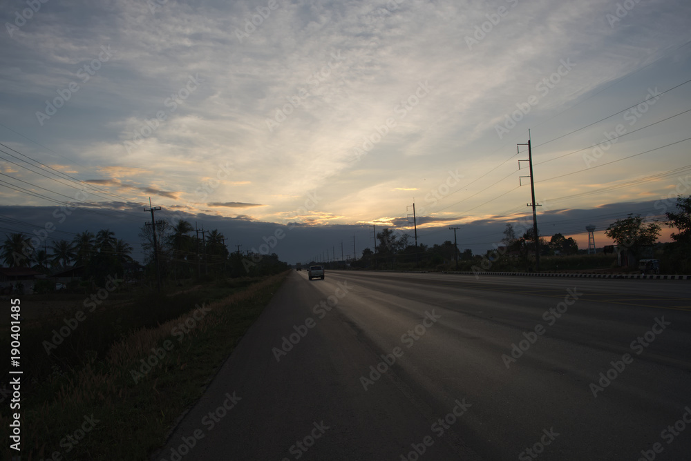 Fototapeta premium Travel by car to reach the destination before sunset.