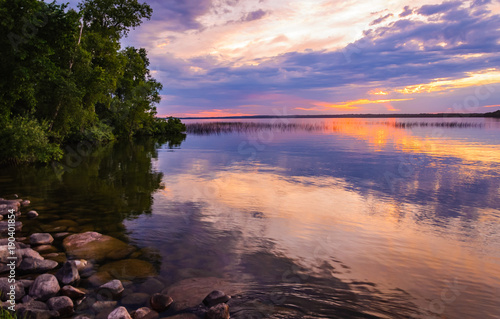 Reflecting clouds and restive colors of a tranquil sunset in Minnesota photo