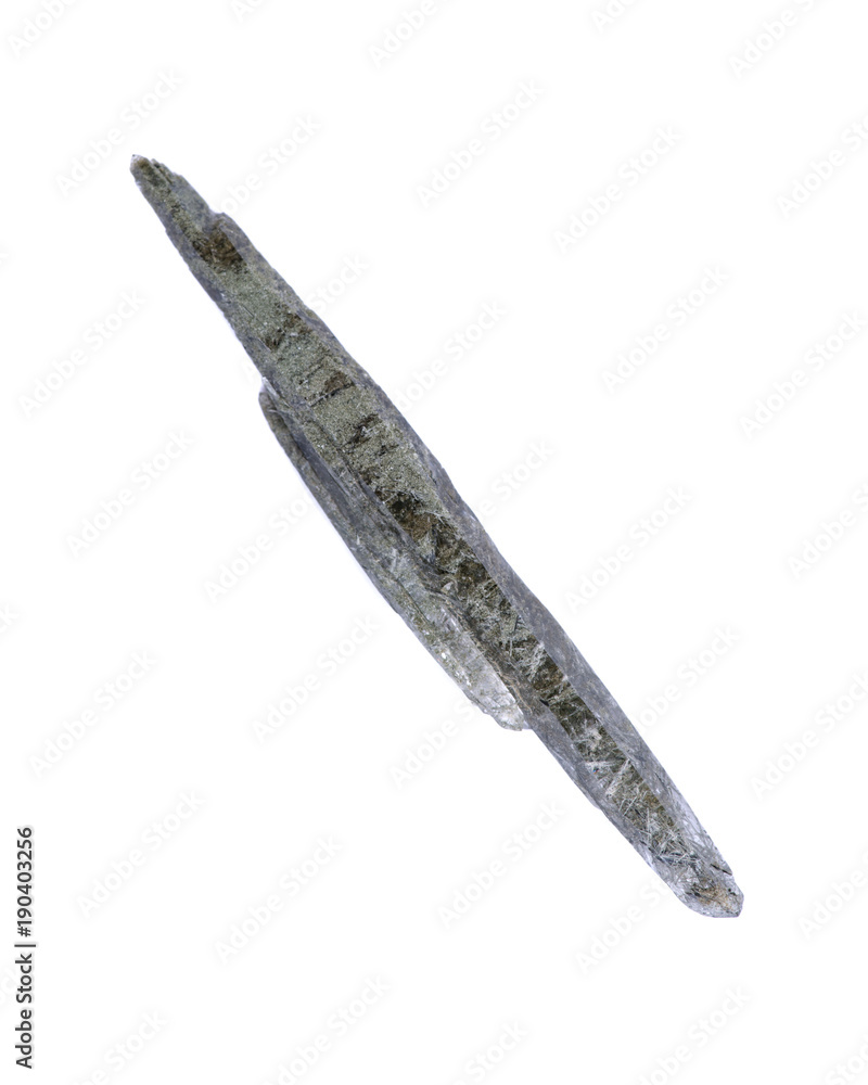 Clear quartz double terminated point covered in chlorite, from the mountains of Nepal, isolated on white background Clear quartz double terminated point covered in chlorite, from the mountains of Nepal, isolated on white background
