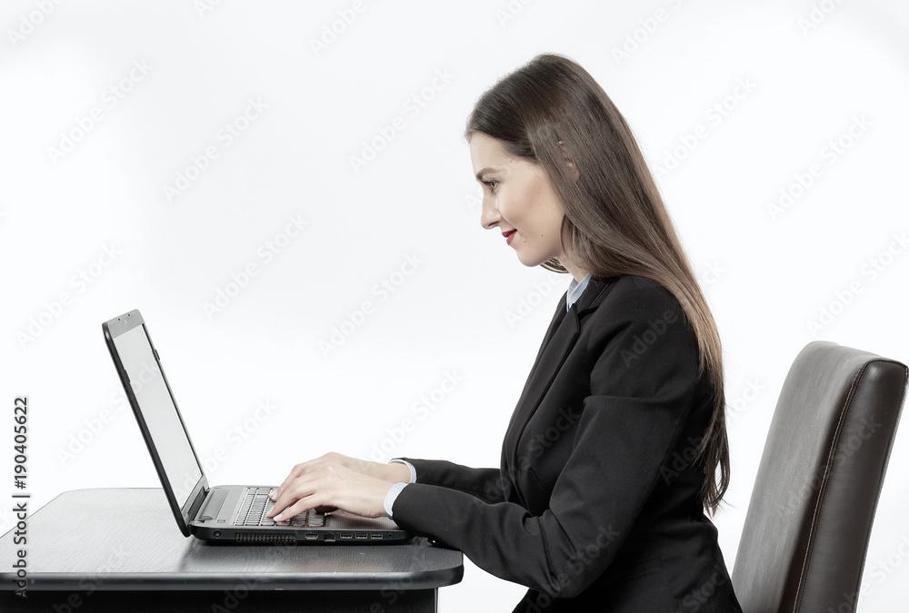 Businesswoman working on her laptop Businesswoman working on her laptop