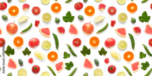 Background food texture. Seamless pattern of various fresh vegetables and fruits (grapefruit, currant leaf, green peas, tomato, apple, pomegranate) isolated on white background, top view, flat lay. 