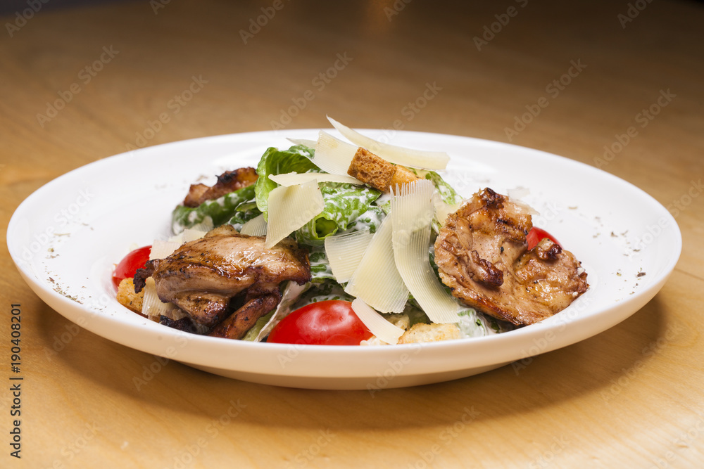 Caesar Salad plate with chicken breast pieces Caesar Salad plate with chicken breast pieces