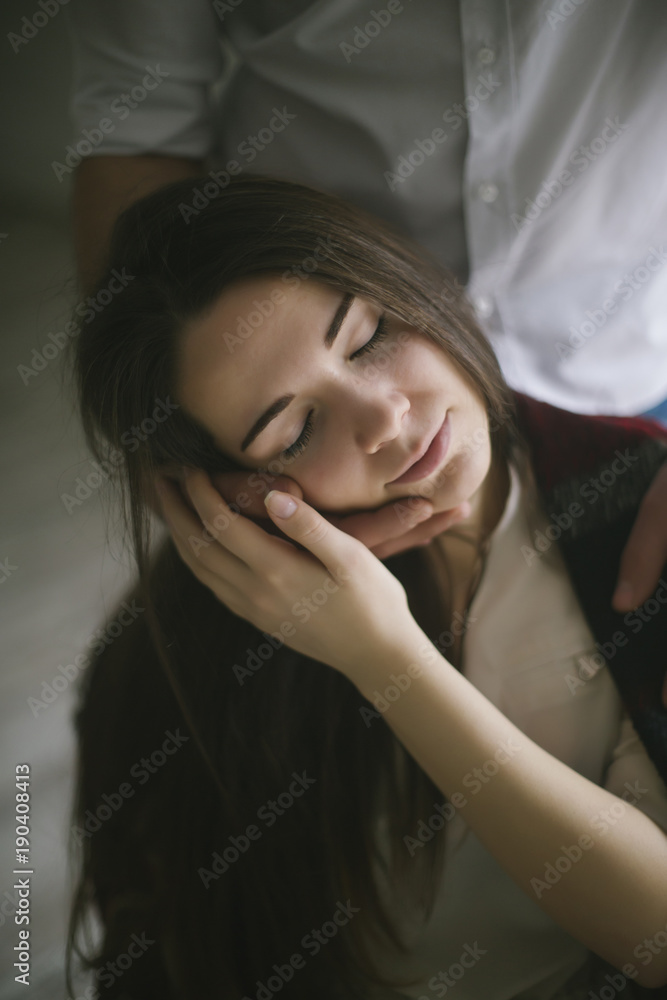 Caucasian man caressing face of woman Caucasian man caressing face of woman