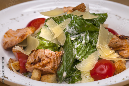 Caesar Salad plate with chicken breast pieces
