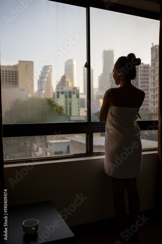 Young girl in her hotel room after a shower. 