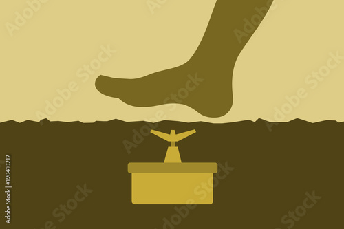 Anti-personnel landmine ( land mine ) is under surface of ground. Human foot and leg is goint to step and tread on the deadly military weapon. Minefield from the war and warfare