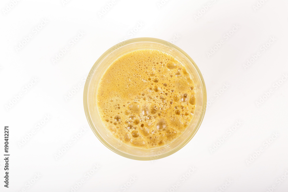 A glass of fresh apple juice isolated on white background A glass of fresh apple juice isolated on white background