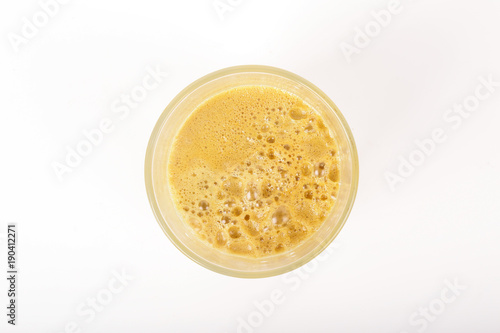 A glass of fresh apple juice isolated on white background