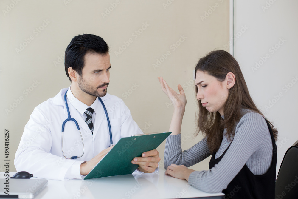 Doctor checking detail for treat patient at clinic. People with medical concept. Doctor checking detail for treat patient at clinic. People with medical concept.