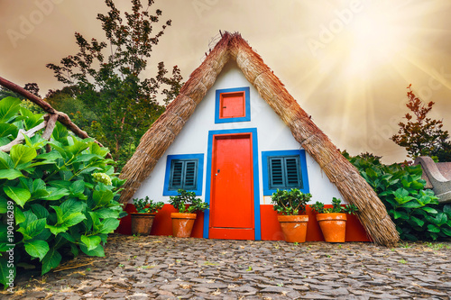 Portuguese traditional house in Santana, Madeira Island photo