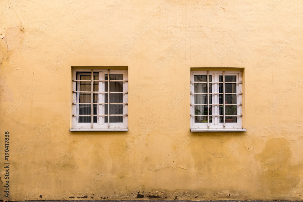 A pair of unique looking windows in Europe. 