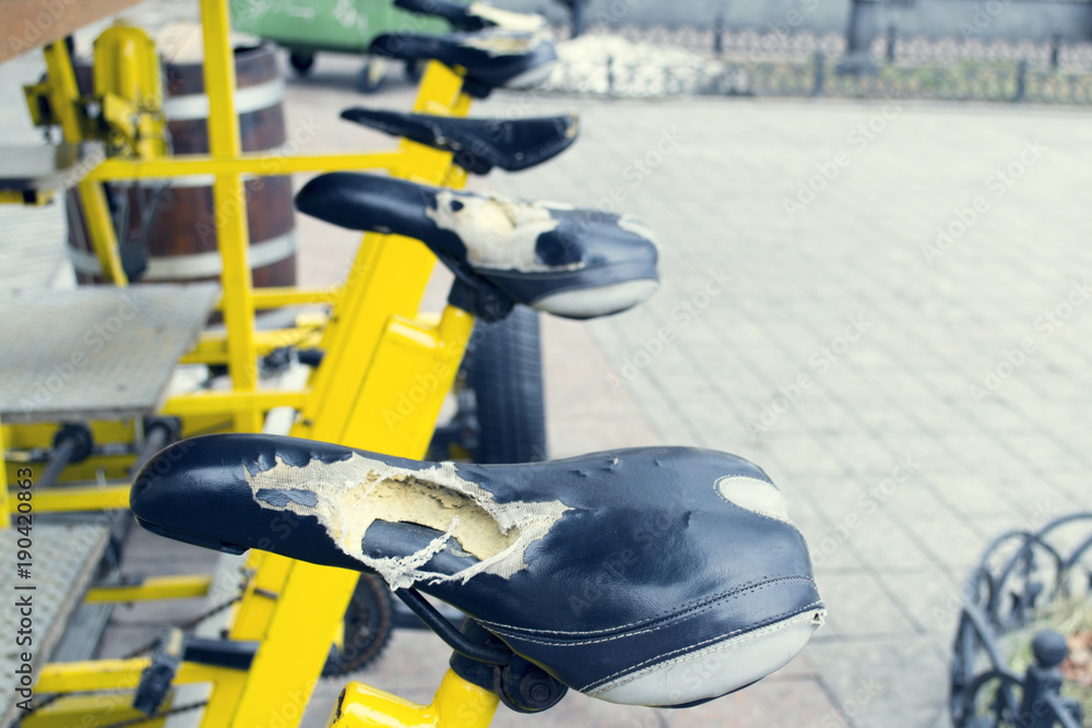 An old broken bicycle seat An old broken bicycle seat