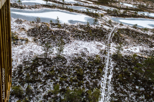 High angle view of the Mukri bog and the boardwalk in winter, Estonia photo