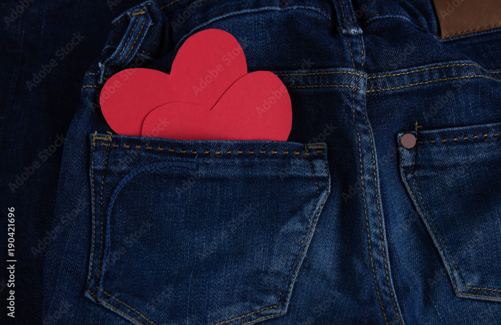 Blue jeans pants with hearts in back pocket. Valentines Day concept  Stock-Foto | Adobe Stock