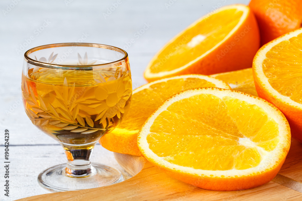 Fotografie Sliced orange on cutting board