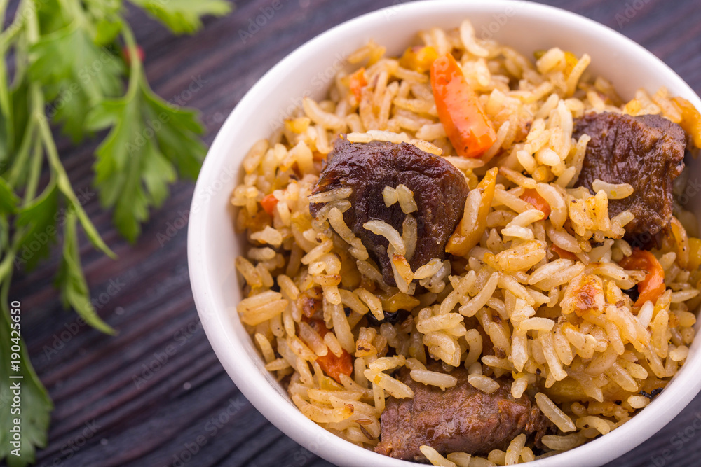 Meat pilaf with meat pieces, vegetables and greens Meat pilaf with meat pieces, vegetables and greens