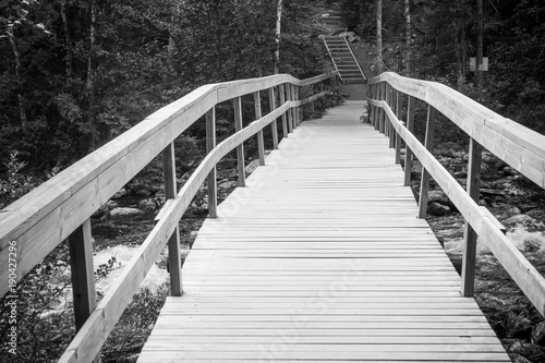 Fototapeta Naklejka Na Ścianę i Meble -  Wooden bridge on the river, Finland
