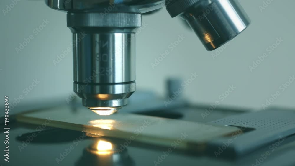 Close-up shot of microscope at laboratory. Close-up shot of microscope at laboratory.