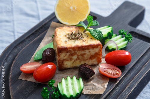 Fried halloumi cheese or cheese Saganaki photo