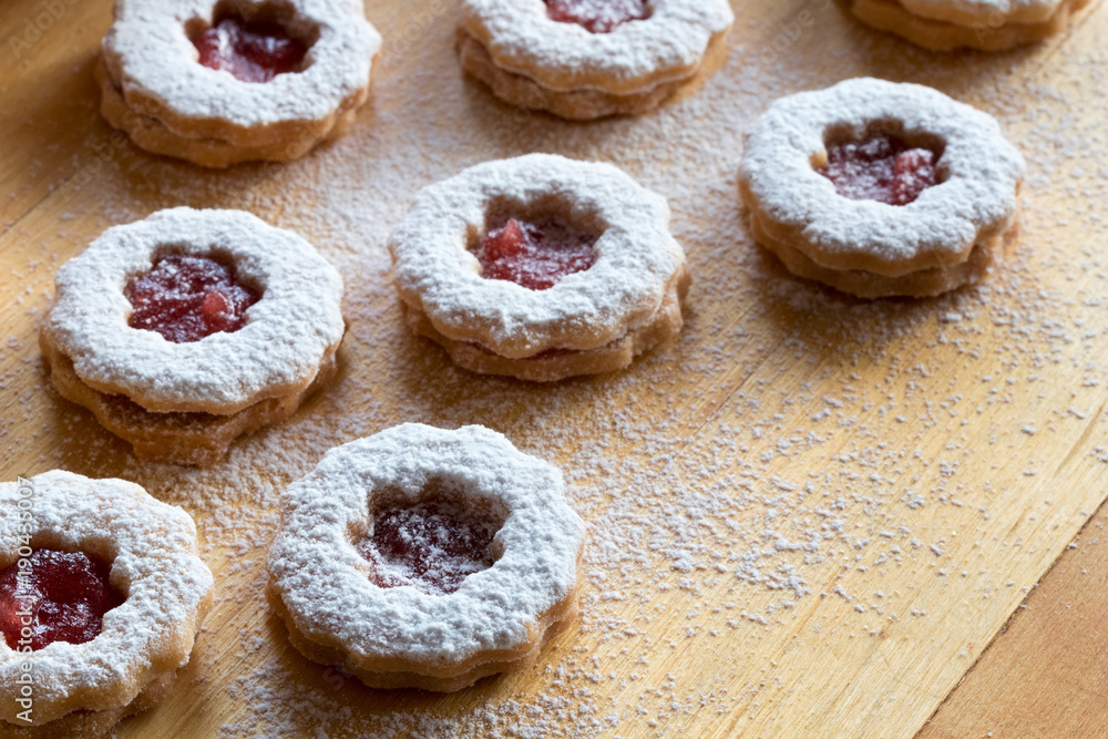 Trraditional Linzer Christmas cookies dusted with sugar