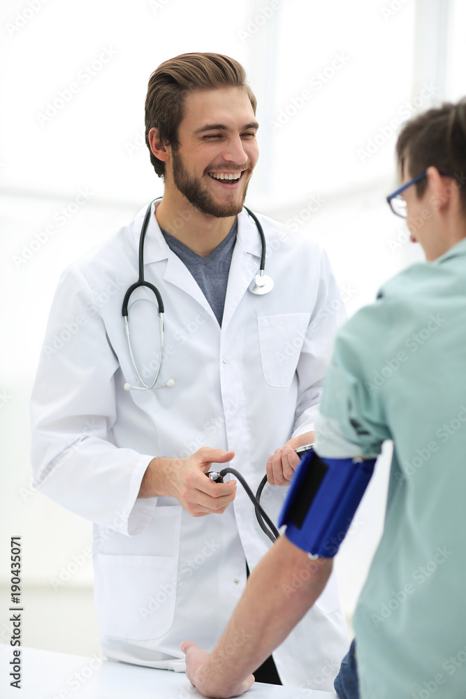 doctor doing a routine inspection of the patient doctor doing a routine inspection of the patient